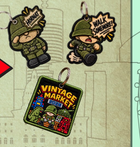 Embroidered army recruit patches and a Vintage Market keychain